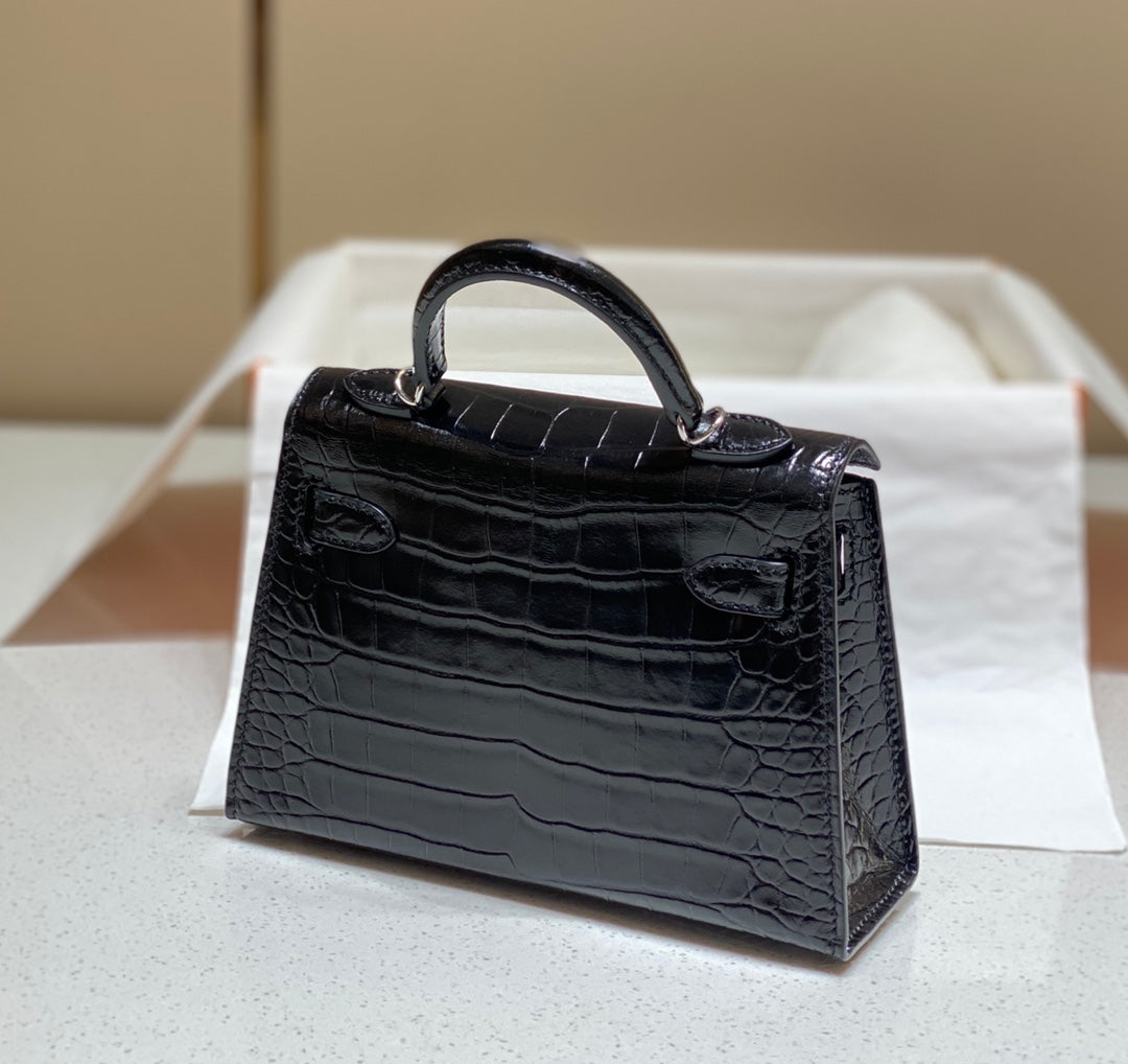 HERMES 25S MINI KELLY 19 IN BLACK CALFSKIN SILVER HARDWARE